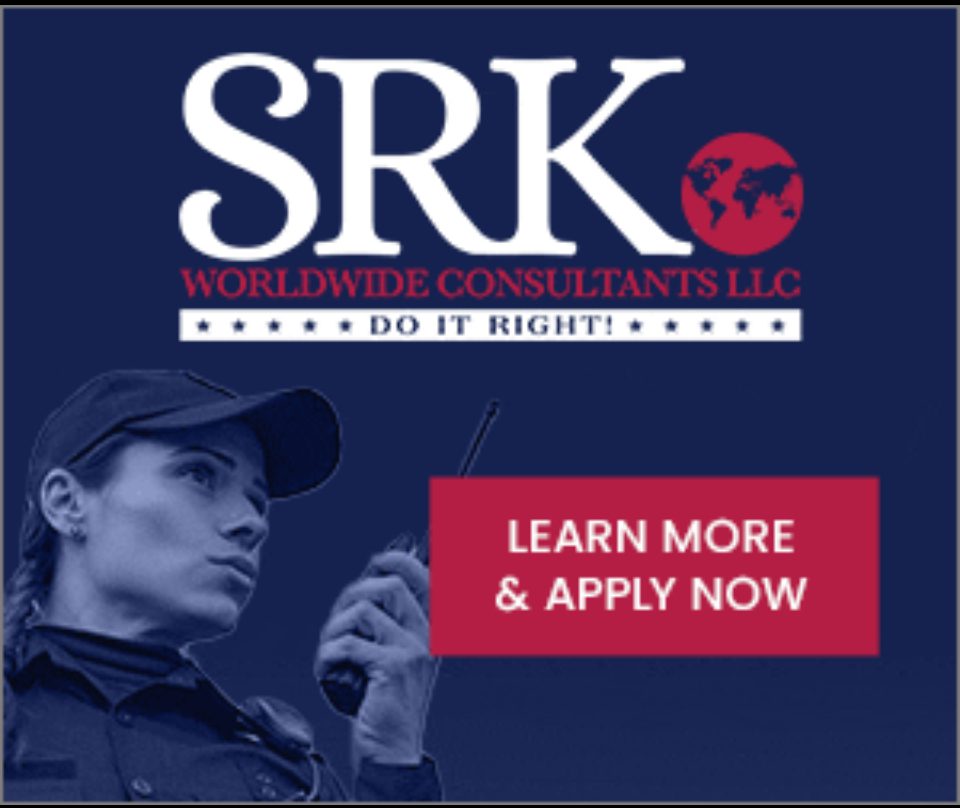 Businessman shaking hands in formal setting.