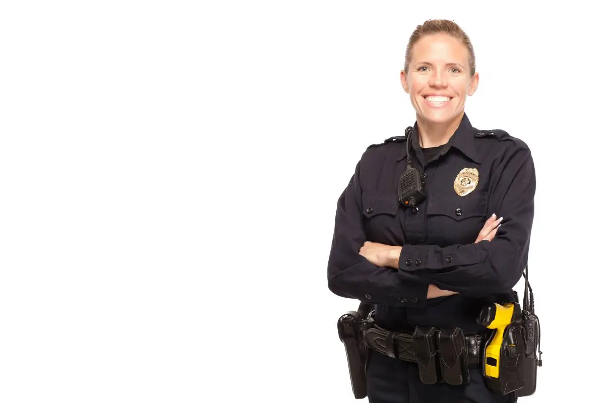 A female police offer, smiling