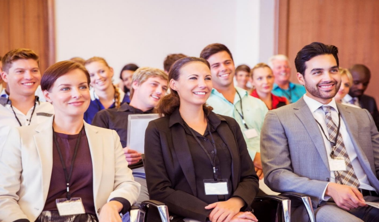 Group of people attending a conference.