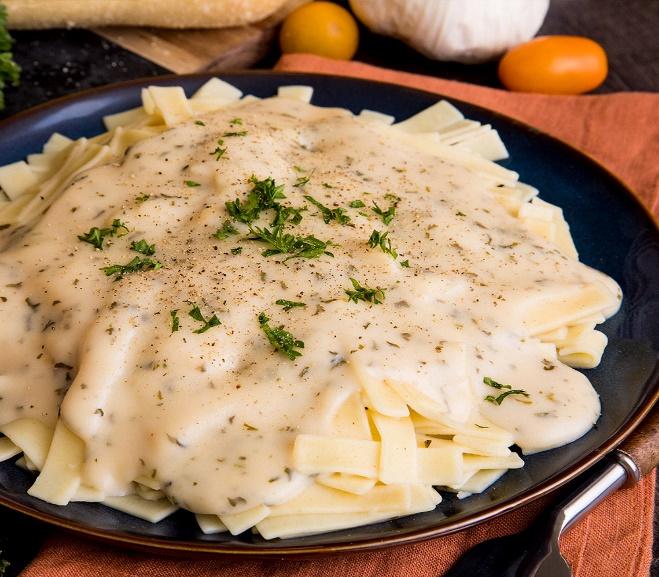 Creamy pasta with herbs and pepper.