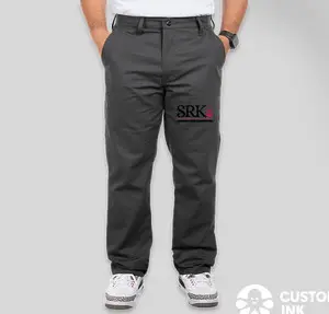 Gray pants with SRK logo embroidery.