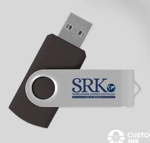 Silver and black USB flash drive with logo.